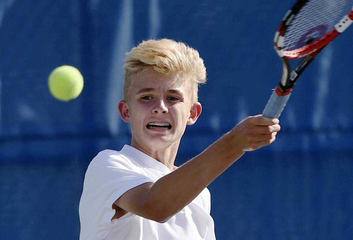 Clovis North's Michael Fourchy returns to Clovis West's Cody Castro on Fourchy's way to win 6-1, 6-0 on court one at the Central Section Division I boys tennis championship Wednesday, May 16, 2018 in Clovis. Fourchy is the No. 2 see in the boys individual playoffs.