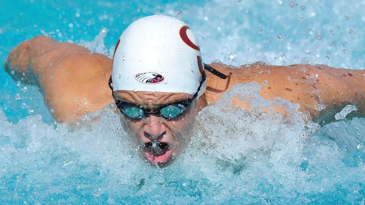 Clovis West High’s Matt Elkington competes in the 100-yard butterfly during the 2015 CIF State Swimming and Diving Championships at Clovis West.