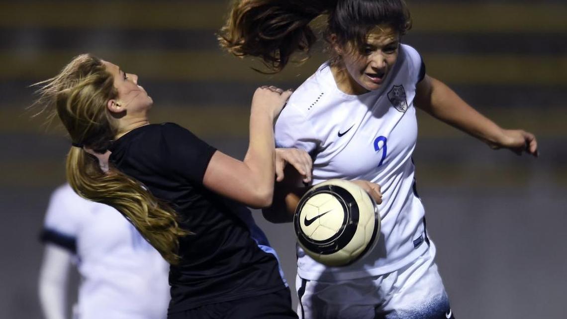 Clovis North’s Bella Taglione, left, and Clovis High’s Julia Hardwick, right, Tuesday, Feb. 21, 2017 in Clovis, Calif.