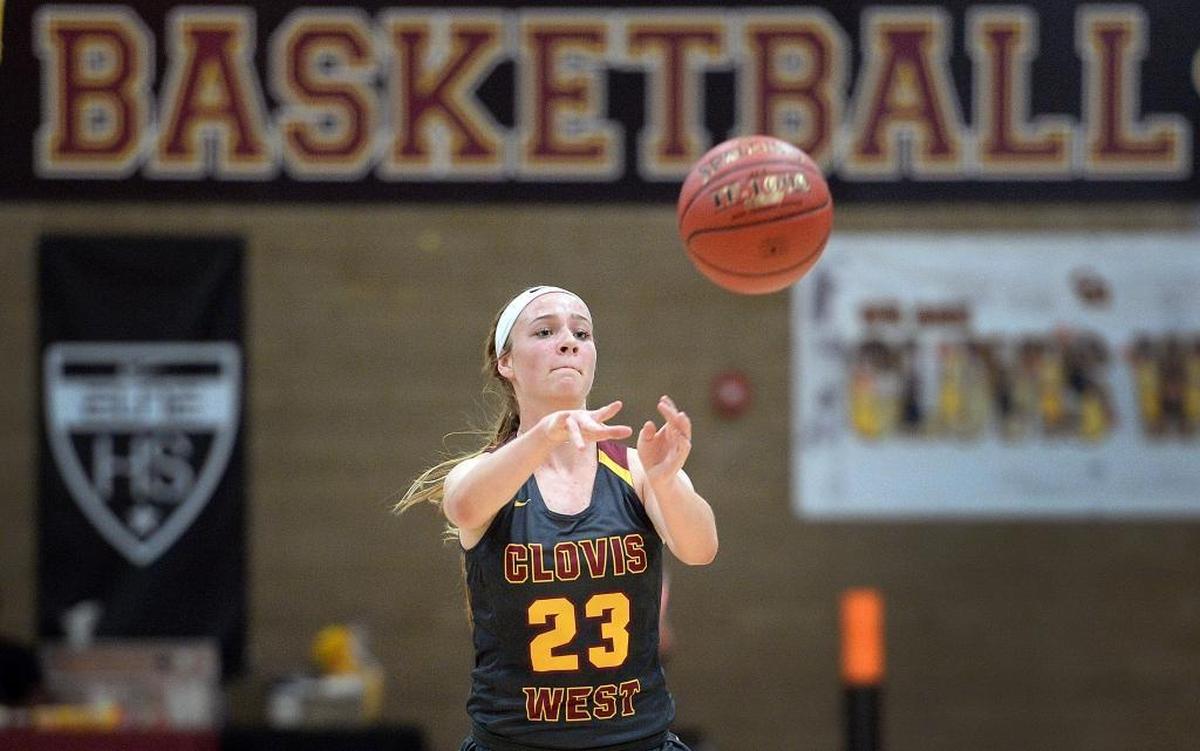 Clovis West’s Madison Campbell passes the ball during their game against Garces in the Central Valley Showdown tournament at Clovis West on Thursday, Nov. 30, 2017.