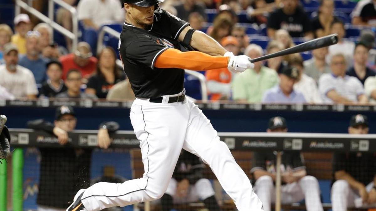 Marlins slugger Giancarlo Stanton, shown hitting against the Braves earlier this season, launched a batting-practice home run into the players’ parking lot in San Francisco on Sunday.