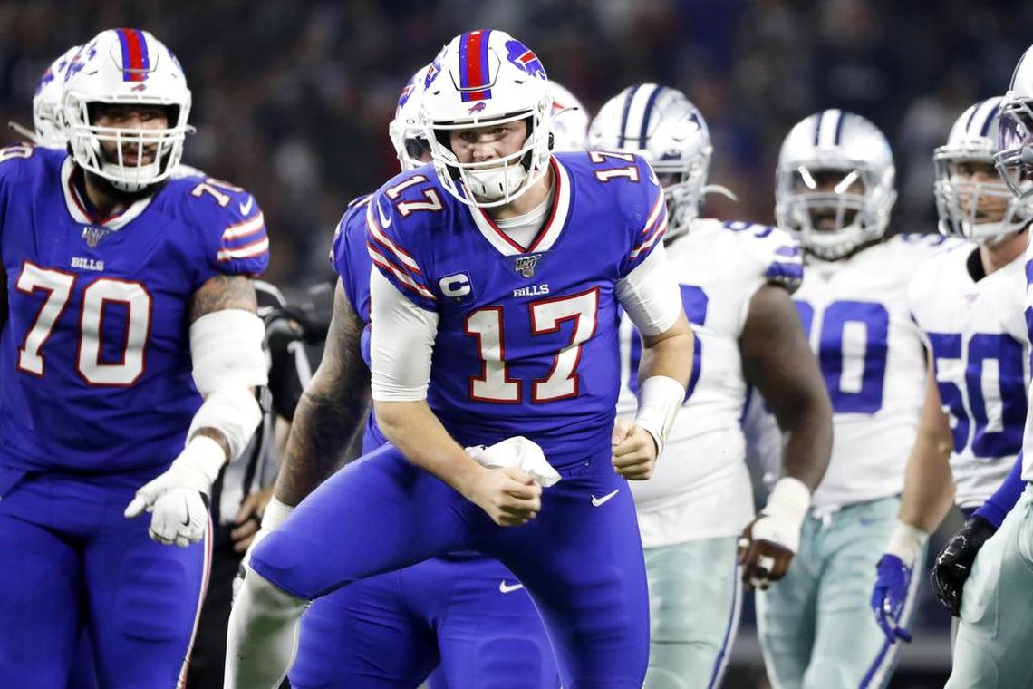 Buffalo Bills quarterback Josh Allen (17) celebrates after a quarterback sneak to convert on fourth down during the first half of an NFL football game last season against the Dallas Cowboys.