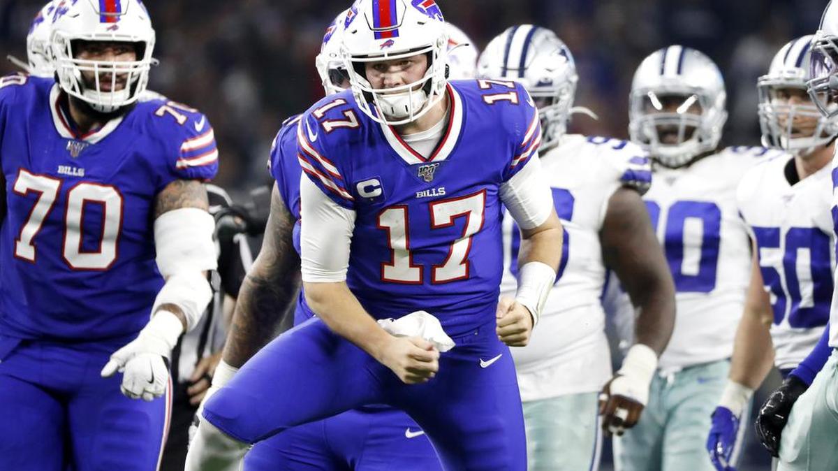 Buffalo Bills quarterback Josh Allen celebrates after a quarterback sneak to convert on fourth down against Dallas on Thanksgiving Day.
