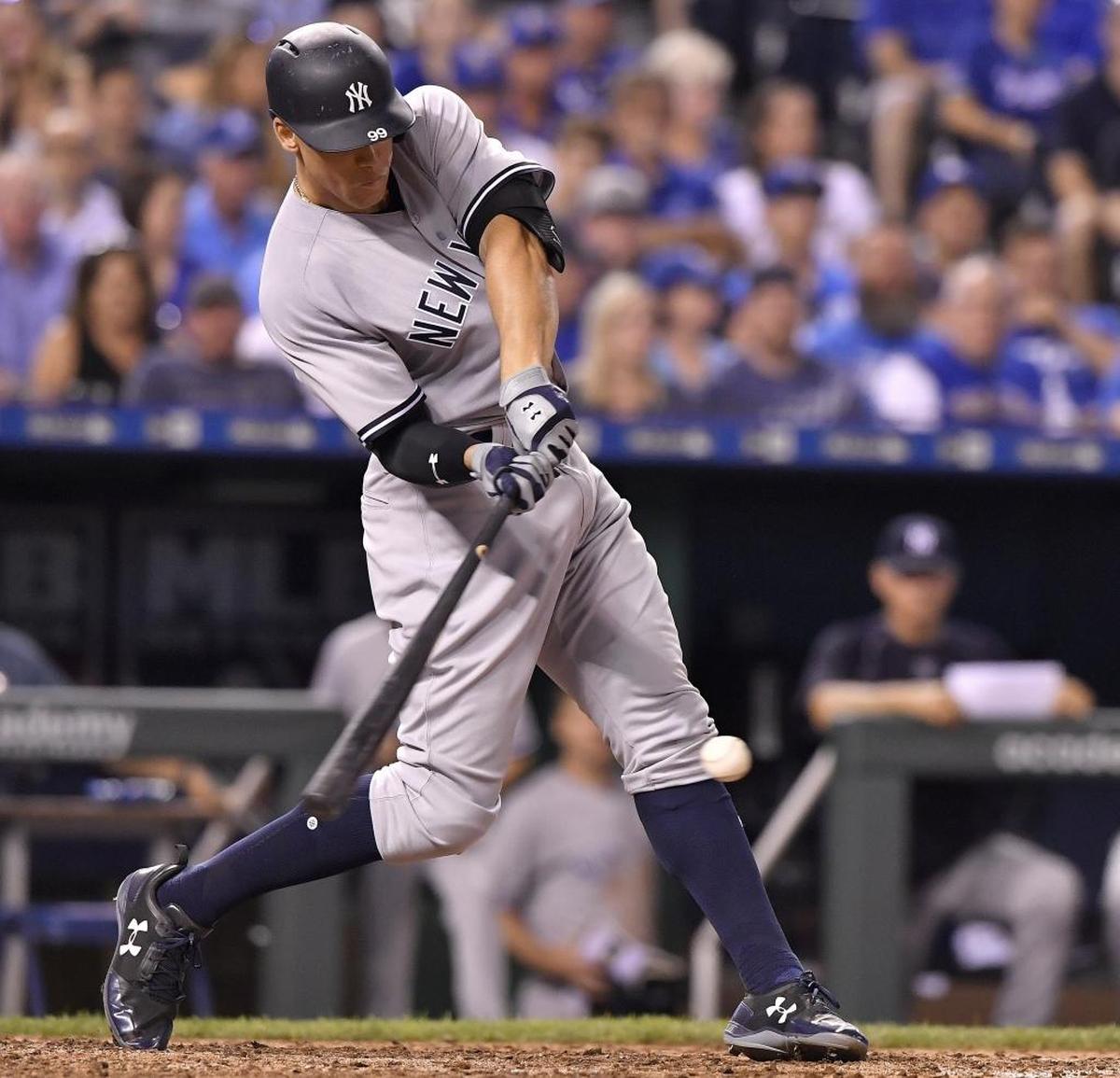 Aaron Judge launches his 6-foot-7, 282-pound frame into a swing against the Kansas City Royals this season. Through Friday, Judge was leading the majors in home runs, with 17.