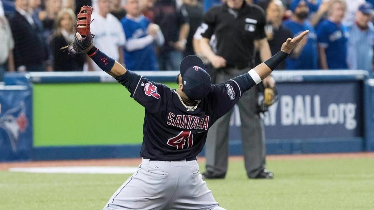 Cleveland’s Carlos Santana rejoices after the final out of the American League Championship Series on Wednesday, Oct. 19, 2016.