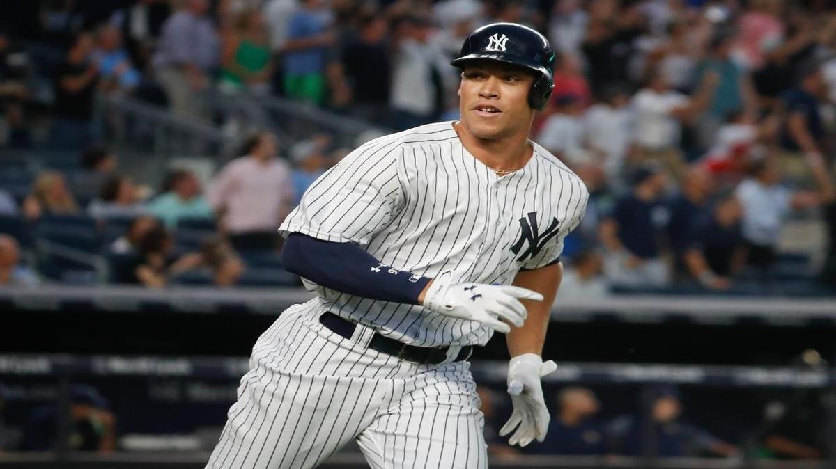 New York Yankees’ Aaron Judge looks back at the dugout as he heads up the first base line after hitting a solo home run against the Tampa Bay Rays during the fourth inning of a baseball game, Friday, July 28, 2017, in New York.