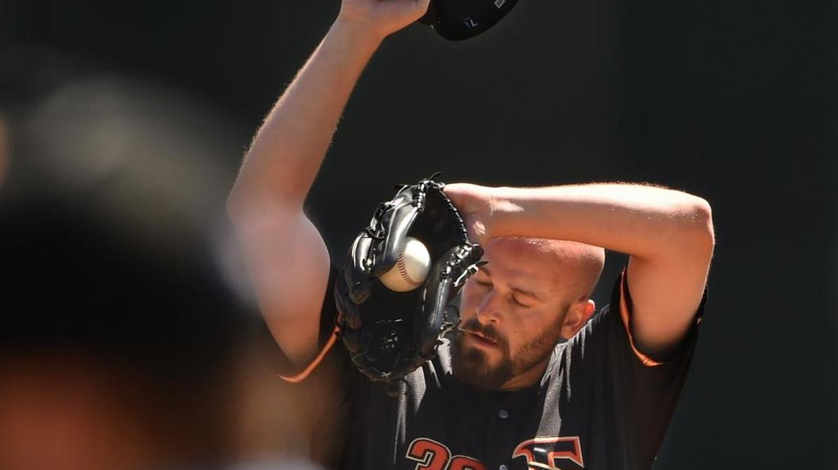 Grizzlies pitcher Mike Hauschild wipes his forehead between batters during a warm outing against Las Vegas on April 18, 2016. Hauschild is 4-6 with a 4.08 ERA in 10 starts for the Grizzlies this year after going 7-5 with a 3.49 over 15 starts for them in 2015.