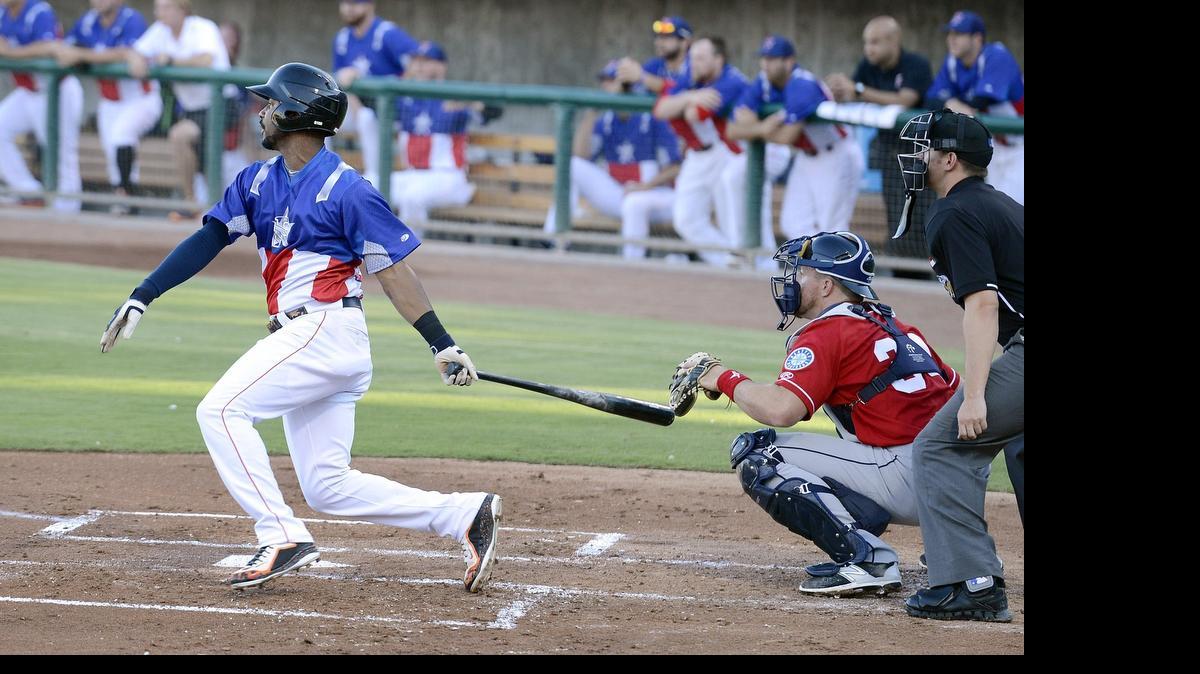 
Fresno’s L.J. Hoes follows through after a run-scoring single in Saturday’s game against Tacoma at Chukchansi Park. Hoes is among the Pacific Coast League leaders in hitting, part of the reason he was named earlier in the week as a Triple-A All-Star.
