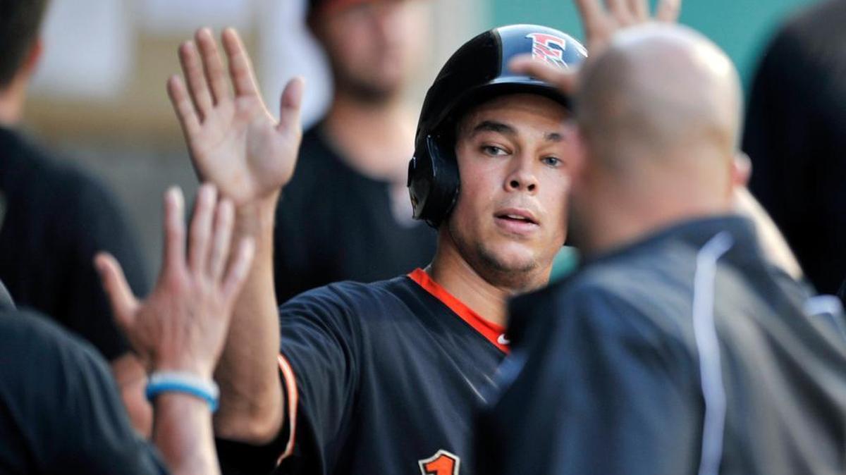 
Fresno’s Joe Sclafani, center, has been able to stay consistent at the plate despite inconsistent playing time.
