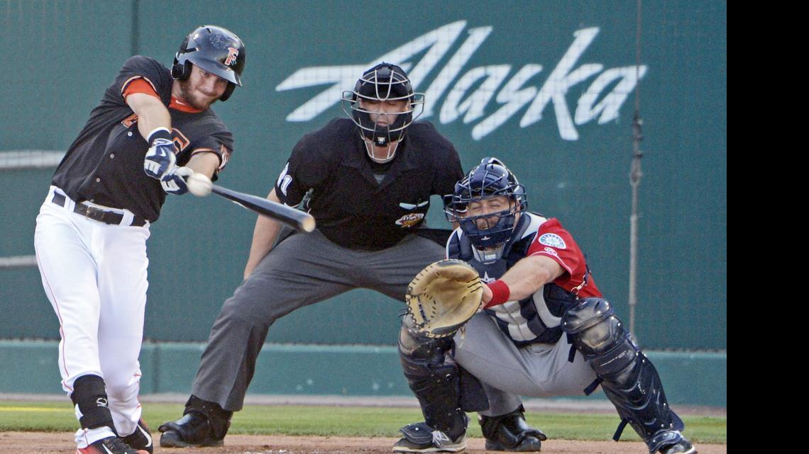 
Fresno's Robbie Grossman gets an RBI single against Tacoma in their game at Chukchansi Park Monday, July 6, 2015. 
