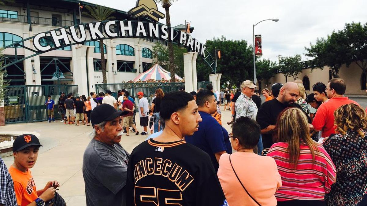 
Crowds line up early on Thursday, waiting to get into Chukchansi Park for the annual Taco Truck Throwdown during the Fresno Grizzlies game. A sell-out crowd is expected. 
