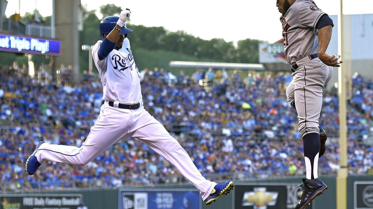 
Kansas City’s Alcides Escobar is called out as Houston first baseman Jon Singleton leaps and comes down on the base in time to end the third inning of a July 24, 2015, game at Kauffman Stadium.
