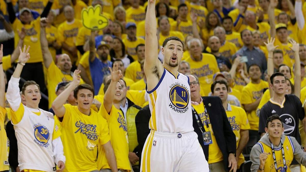 Klay Thompson and the Warriors’ fans watch a three-pointer fly in Golden State’s 110-99 victory over Portland in Game 2 of their playoff series in Oakland on Tuesday, May 3, 2016.