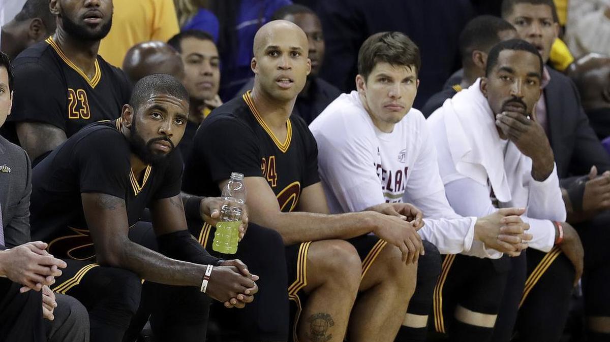 From left, the Cleveland Cavaliers’ LeBron James, Kyrie Irving, Richard Jefferson, Kyle Korver and J.R. Smith sit on the bench during the second half of Game 2 of the NBA Finals against the Golden State Warriors in Oakland, Calif., Sunday, June 4, 2017.