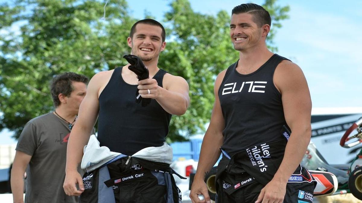 Oakland Raiders quarterback and Fresno State alum Derek Carr, left, and his brother, former NFL quarterback David Carr, take a break during filming at Valley Children’s Healthcare in 2016. The Carrs expanded their work as hospital spokesmen, partnering with Dignity Health Mercy and Memorial Hospitals in Bakersfield on June 16, 2017.