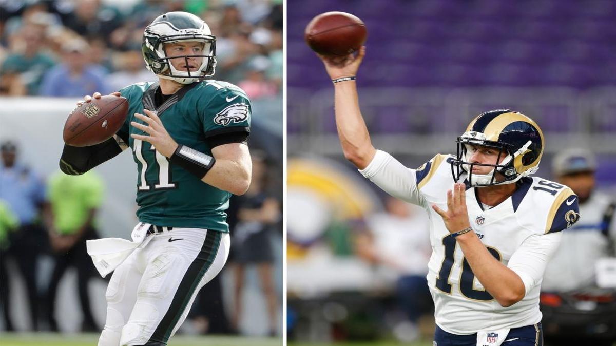 A tale of two rookies: quarterbacks Carson Wentz of the Philadelphia Eagles, left, and Jared Goff of the Los Angeles Rams.