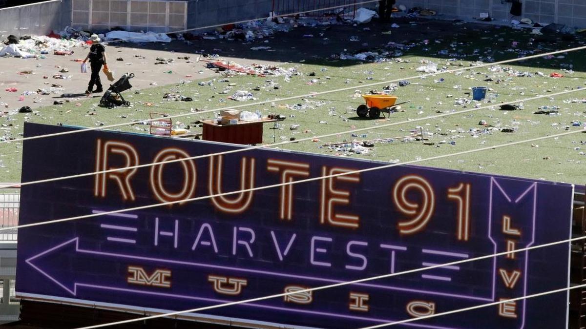 Investigators work the scene Monday, Oct. 2, 2017, after a mass shooting at a music festival near the Mandalay Bay resort and casino on the Las Vegas Strip on Sunday in Las Vegas.