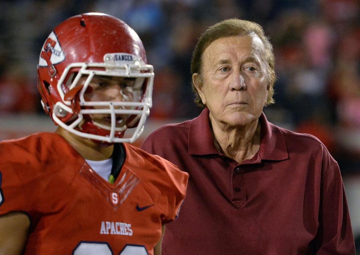 Former Oakland Raiders coach Tom Flores, a Sanger High graduate, attends the coin toss ceremony before the start of the Apaches’ 2016 game against Bullard at Sanger’s Tom Flores Stadium.