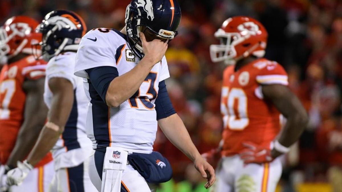 Denver Broncos quarterback Trevor Siemian walks to the sideline after calling a timeout during the second half of an NFL football game in Kansas City, Mo., Monday, Oct. 30, 2017. Siemian, NFL Network analyst David Carr says, is the Broncos’ best chance to win games this season. But Carr also expects general manager John Elway to make a move this offseason.