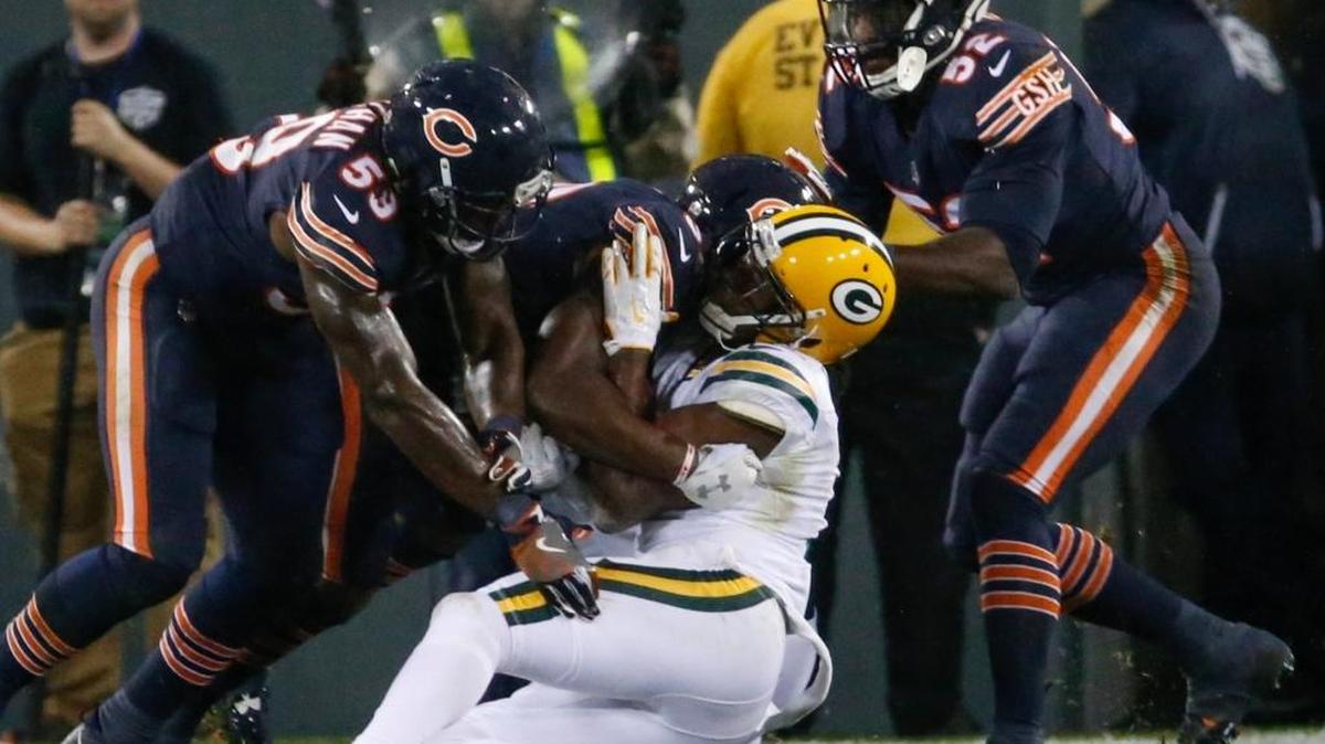 Chicago Bears linebacker Danny Trevathan, left, comes in for the late hit on Green Bay Packers receiver Davante Adams, a star receiver for Derek Carr at Fresno State, during the second half of the Sept. 28 game. Trevathan was suspended by the NFL for two games due to the helmet-to-helmet hit, a penalty that was reduced to one game upon appeal.