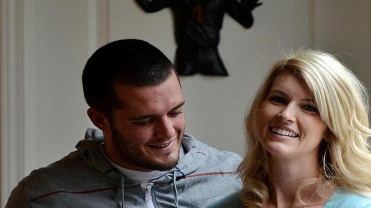 Derek Carr and wife Heather with their newborn son Dallas at their Fresno home Wednesday, October 9, 2013. Derek and Heather celebrated their five-year wedding anniversary during the week of June 26-July 2, 2017.