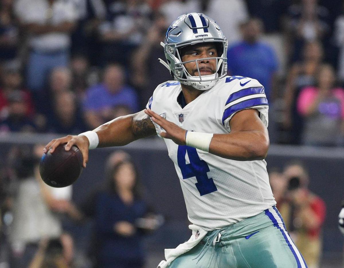 Dallas quarterback Dak Prescott (4) and the Cowboys’ offense could be much more efficient and effective if they were running a modern system, NFL Network analyst David Carr said.