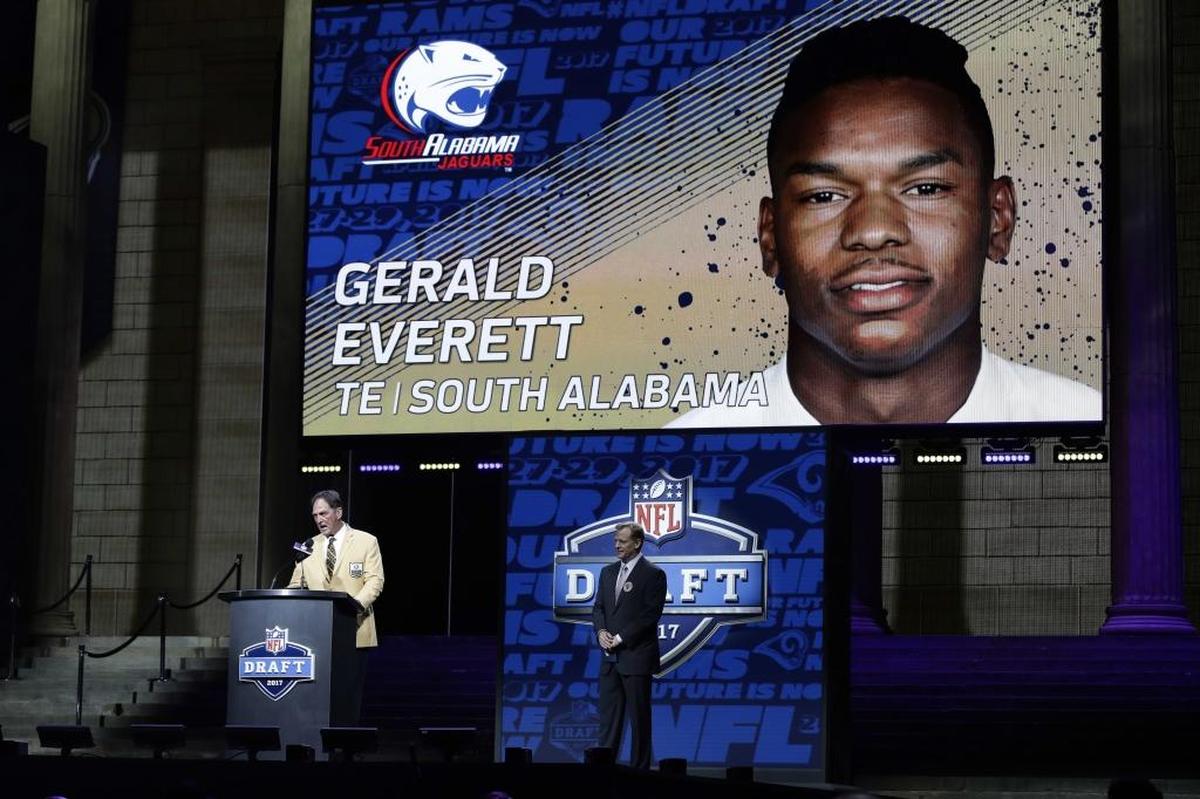 Former Los Angeles Rams player Jack Youngblood, left, announces South Alabama’s Gerald Everett as the Rams' selection in the second round of the 2017 NFL draft.