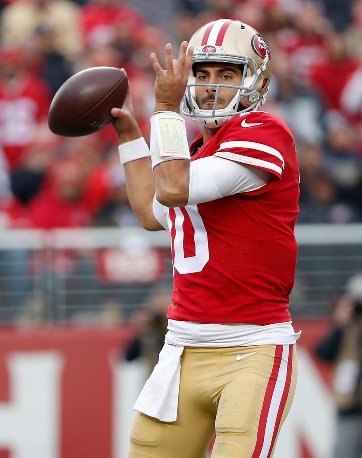 San Francisco 49ers quarterback Jimmy Garoppolo (10) fires a pass in a 44-33 victory over the Jacksonville Jaguars in Santa Clara, Sunday, Dec. 24, 2017. Garoppolo completed 21 of 30 passes for 242 yards and two touchdowns against the Jaguars and is now 4-0 as a starter in San Francisco.