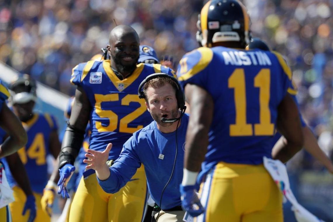 Los Angeles Rams coach Sean McVay reaches out to congratulate wide receiver Tavon Austin after a third-quarter touchdown against the Seattle Seahawks last season.