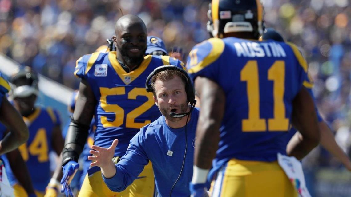 Los Angeles Rams coach Sean McVay reaches out to congratulate wide receiver Tavon Austin after a third-quarter touchdown against the Seattle Seahawks last season.