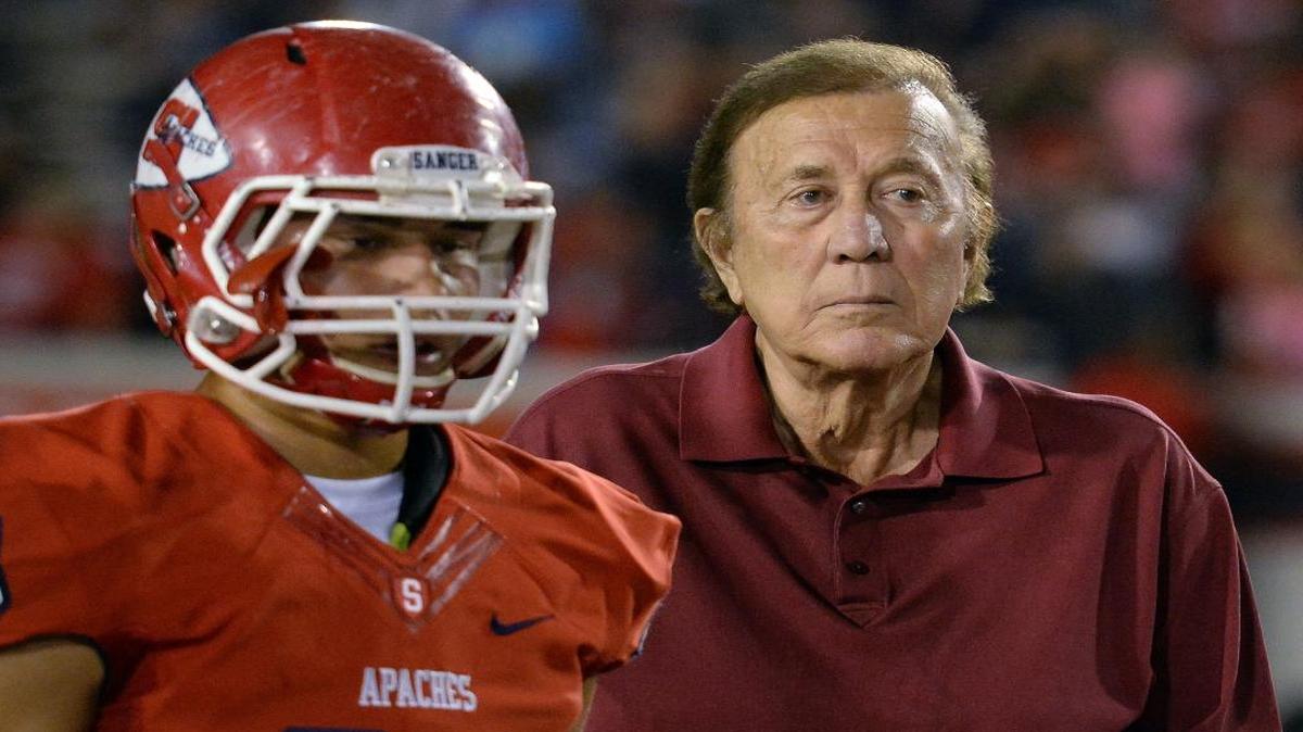 Former Oakland Raiders coach Tom Flores, a Sanger High graduate, attends the coin toss ceremony before the start of the Apaches game against Bullard at Sanger's Tom Flores Stadium Friday, Oct. 7, 2016.