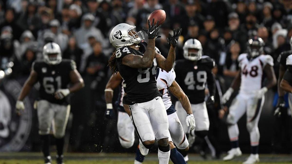 Oakland wide receiver Cordarrelle Patterson hauls in the pass from quarterback Derek Carr that helped seal the Raiders’ 21-14 win over Denver on Sunday.