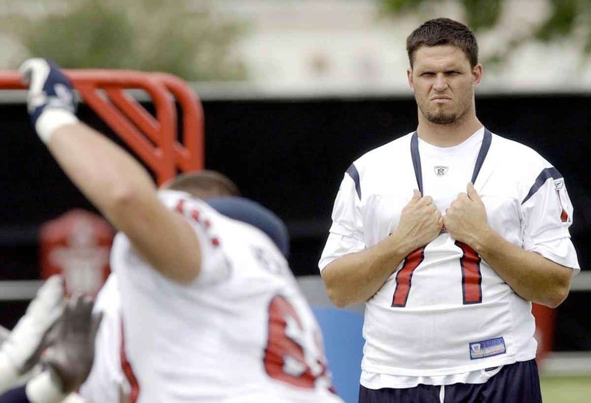Tony Boselli watches as Houston Texans teammates go through drills in August 2002. Boselli played eight years for the Jacksonville Jaguars out of USC, making five Pro Bowls. Then he was picked by the Texans in the NFL expansion draft. But a bad shoulder kept Boselli from playing for Houston and he retired.