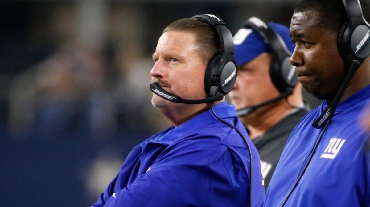 New York Giants coach Ben McAdoo watches play in the closing minutes of the second half of an NFL football game against the Dallas Cowboys on Sunday, Sept. 10, 2017, in Arlington, Texas. The Giants are just 1-7 and NFL analyst David Carr said it could be time for a change.