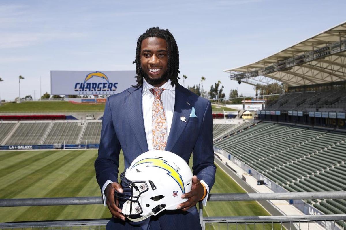 Los Angeles Chargers first-round draft pick Mike Williams poses for photos after a news conference at the StubHub Center in Carson on Friday.