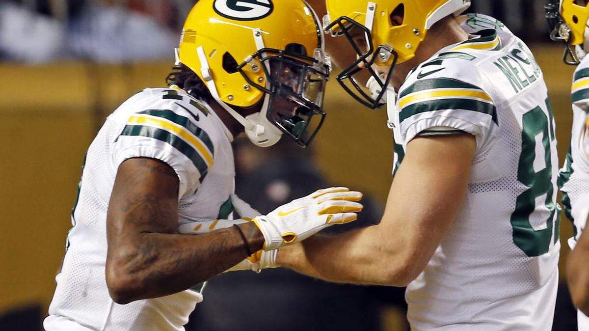Green Bay Packers wide receiver Davante Adams, left, celebrates with Jordy Nelson, right, after scoring during the second half of an NFL football game in Pittsburgh, Sunday, Nov. 26, 2017. Nelson is scheduled to meet with the Oakland Raiders on Wednesday, March 14, 2018.