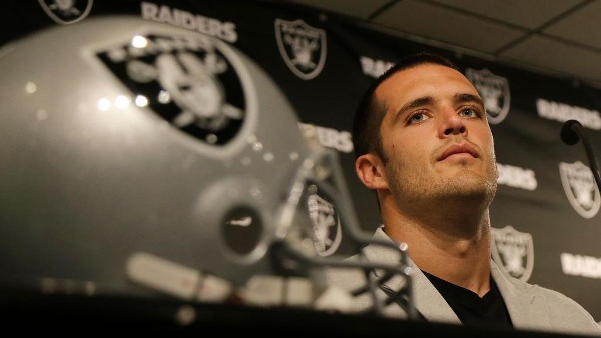 Oakland Raiders quarterback Derek Carr speaks at a news conference in Oakland, Friday, June 23, 2017. In word association, he describes the Raider Nation as loyal, rowdy and faithful.