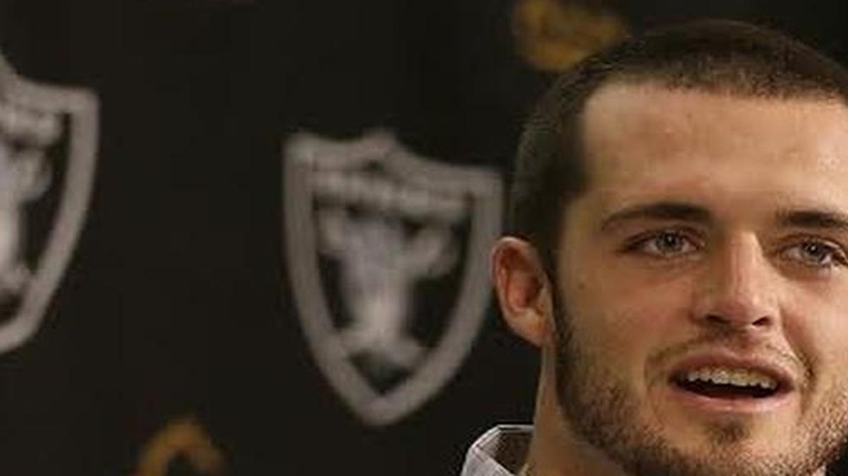 Oakland Raiders quarterback Derek Carr talks with reporters after a 34-31 victory against the San Diego Chargers on Oct. 9, 2016.