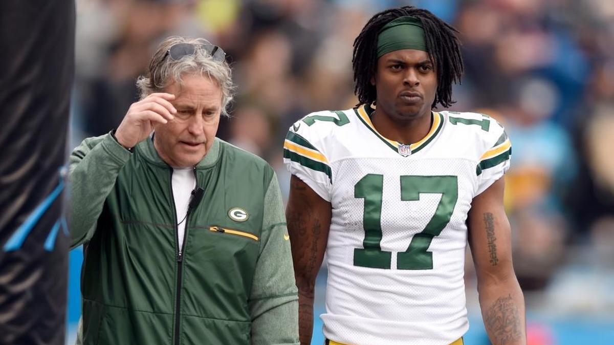 Green Bay Packers' Davante Adams, a former Fresno State star, leaves the field after receiving a helmet-to-helmet hit against the Carolina Panthers in Charlotte, N.C., Sunday.