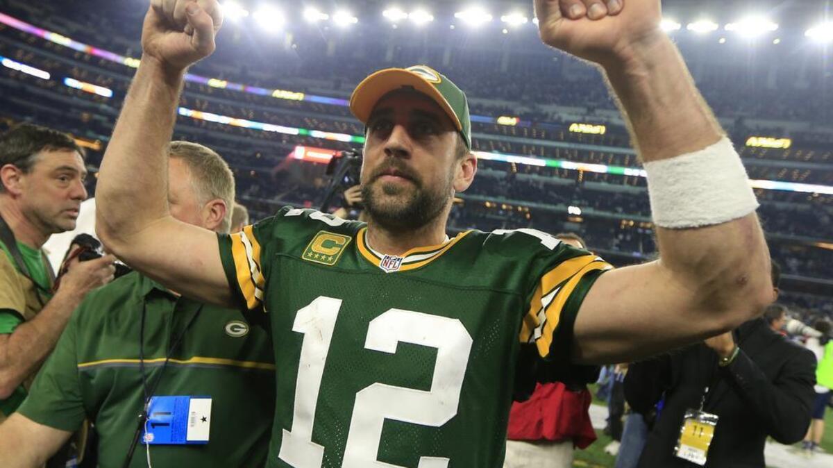 Green Bay Packers' quarterback Aaron Rodgers, celebrating after beating the Dallas Cowboys in an NFL divisional playoff game on Sunday, Jan. 15, 2017, in Arlington, Texas. The Packers were 4-6 after Week 11, but have won eight games in a row including two in the playoffs.