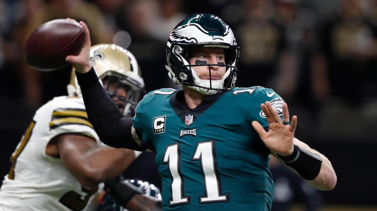 Philadelphia Eagles quarterback Carson Wentz (11) throws a pass in the first half of a a loss to the New Orleans Saints in New Orleans in November. The Eagles are committed to Wentz as their starting quarterback, despite injuries that have cut short his past two seasons and emergence of Nick Foles.