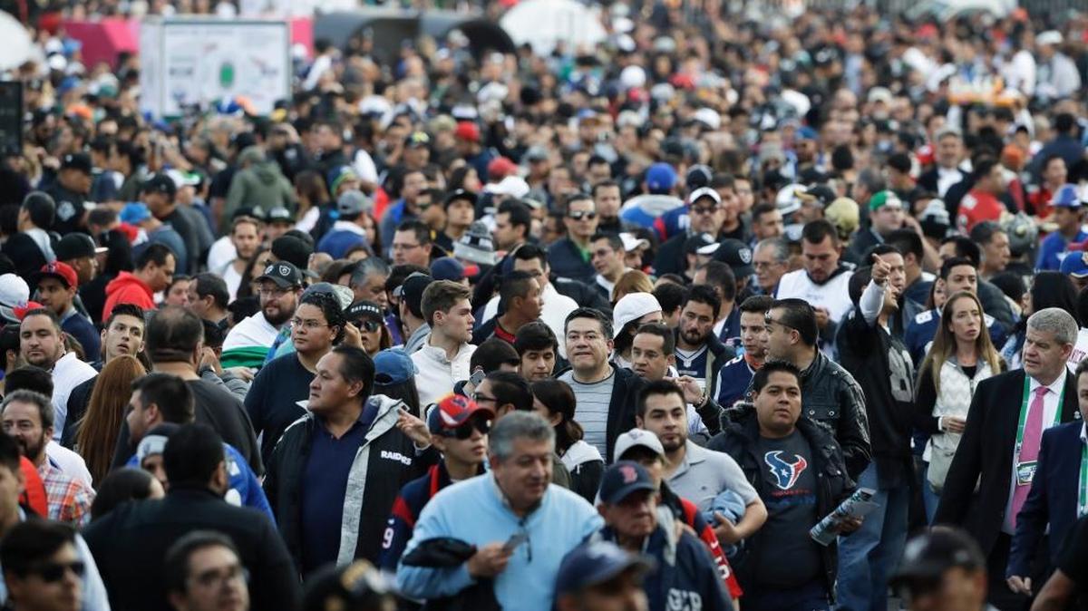 Fans wait to enter Estadio Azteca before an NFL game between the Houston Texans and the Oakland Raiders on Monday in Mexico City.