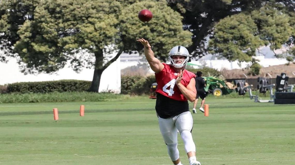 Oakland Raiders quarterback Derek Carr makes a throw at practice in Alameda on Sept. 14, 2017.