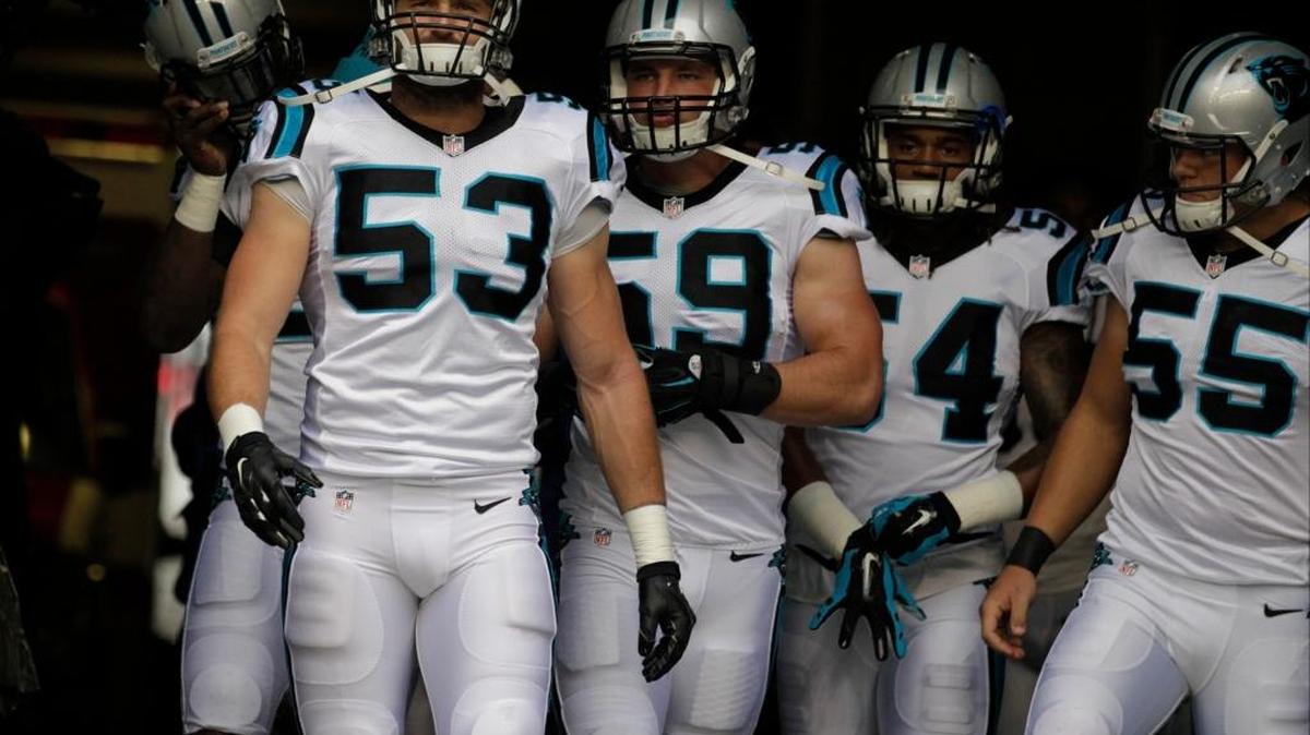 Former Fresno State star Ben Jacobs (53) heads to the field with his Carolina Panthers teammates to take on the Seattle Seahawks last month.