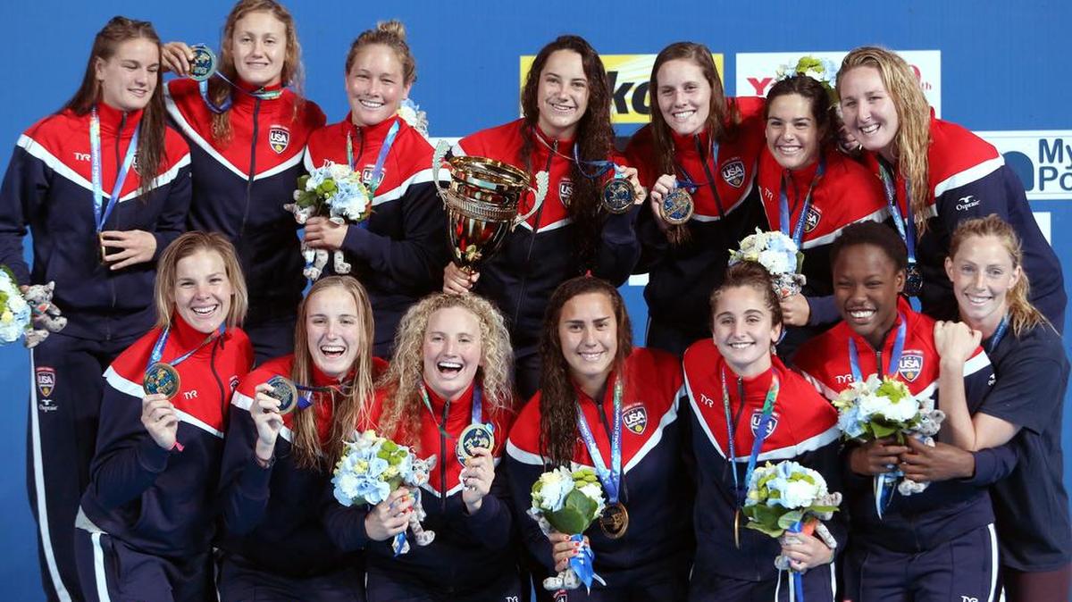 
Members of the US water polo team pose with their gold medals after beating the Netherlands 5-4 in the world final Friday in Kazan, Russia.
