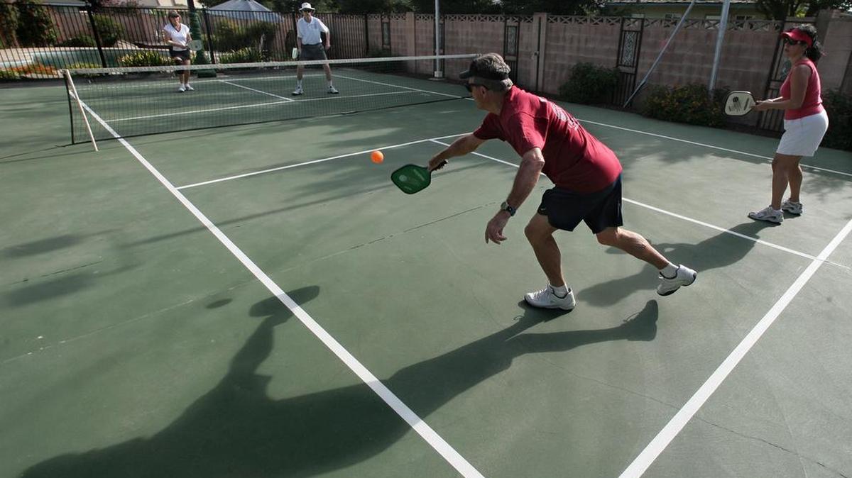 Pickleball is a hybrid of tennis, badminton and ping pong. The game is popular among older athletes, because it features less movement and thus strain on body joints.