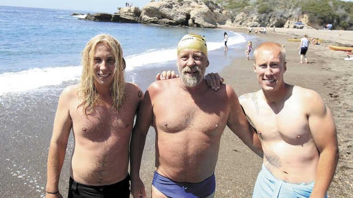 
Dave Van Mouwerik swam 14.4 miles from China Harbor, north of Cayucos, to Spooner’s Cove in Montaña de Oro. His sons, Adam, 21, and Kyle, 24, were part of his support crew. See a gallery of photos from The Tribune at bit.ly/1HS34Ah
