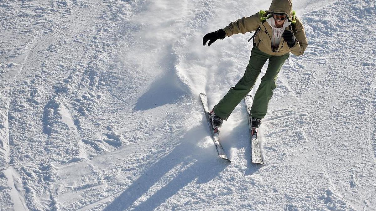 A skier is all smiles as she heads down the mountain on Sunday, December 27, 2015, at China Peak Mountain Resort near Huntington Lake. The ski resort has closed for the season as of Thursday, April 14, 2016.