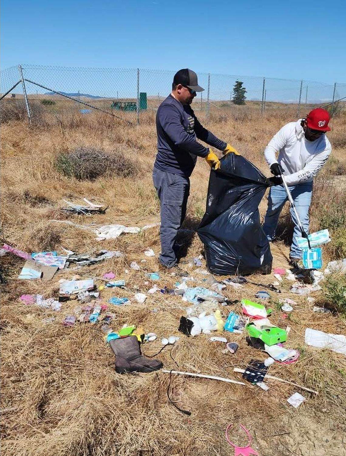 Striperz Gone Wild administrators collect trash along the California Aqueduct near Billy Wright Road west of Los Banos.