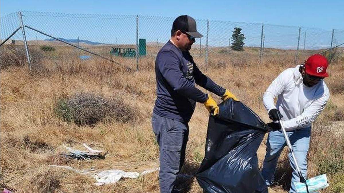 Striperz Gone Wild administrators collect trash along the California Aqueduct near Billy Wright Road west of Los Banos.